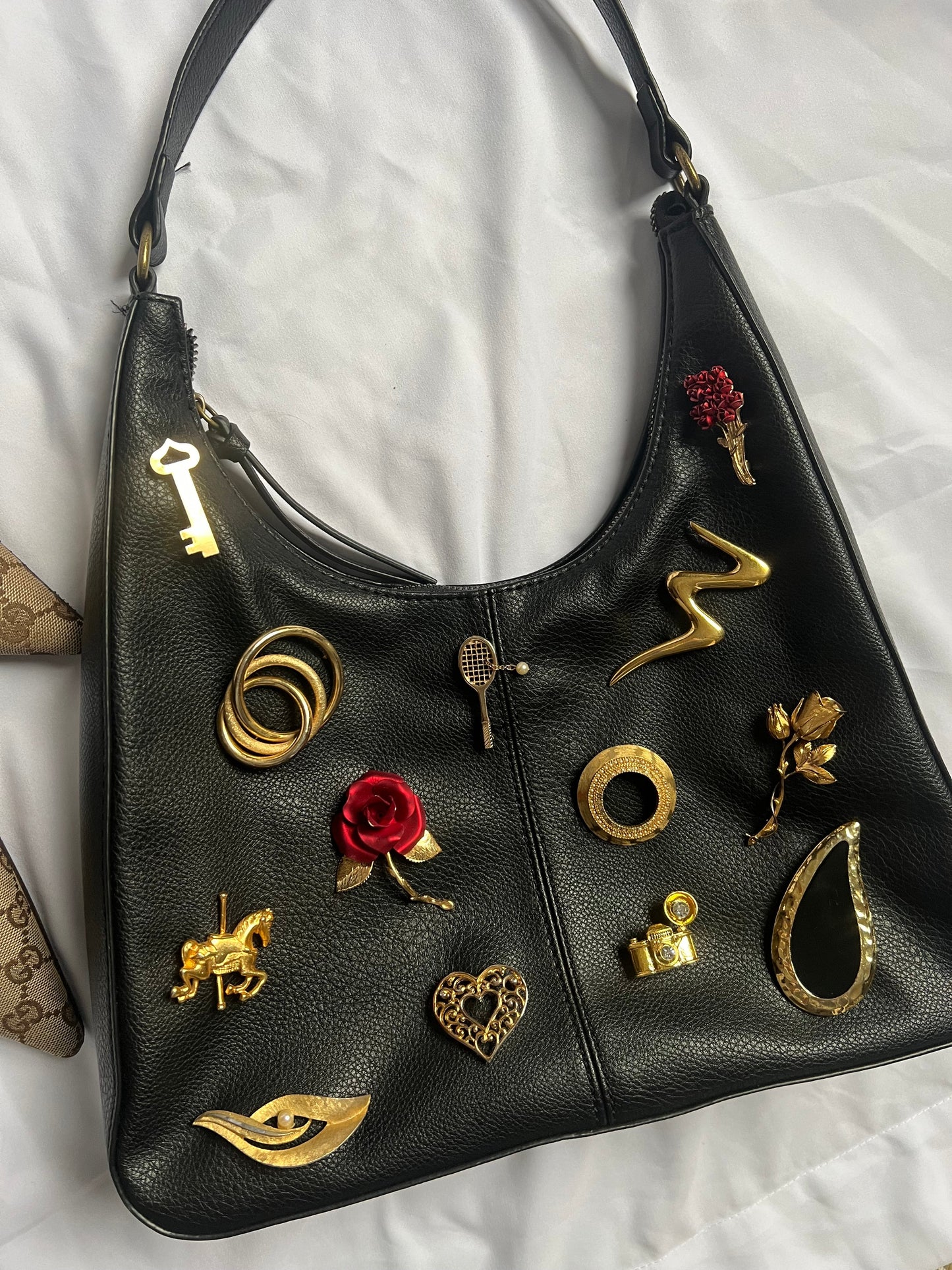 BLACK & GOLD BROOCH BAG