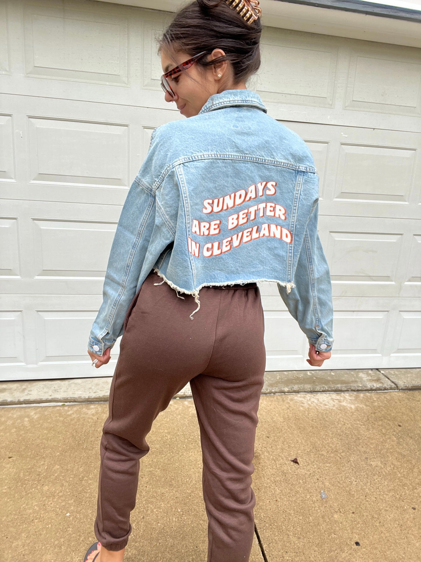 SUNDAYS ARE BETTER IN CLEVELAND CROPPED DENIM JACKET