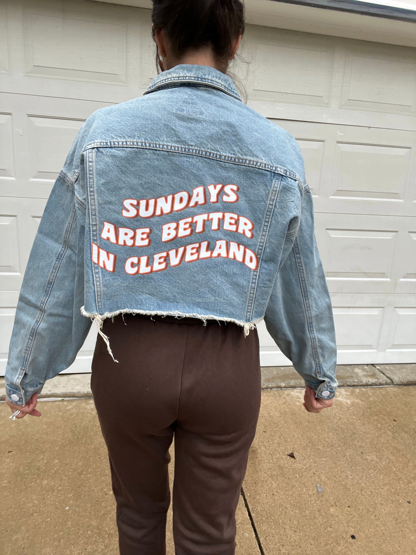 SUNDAYS ARE BETTER IN CLEVELAND CROPPED DENIM JACKET